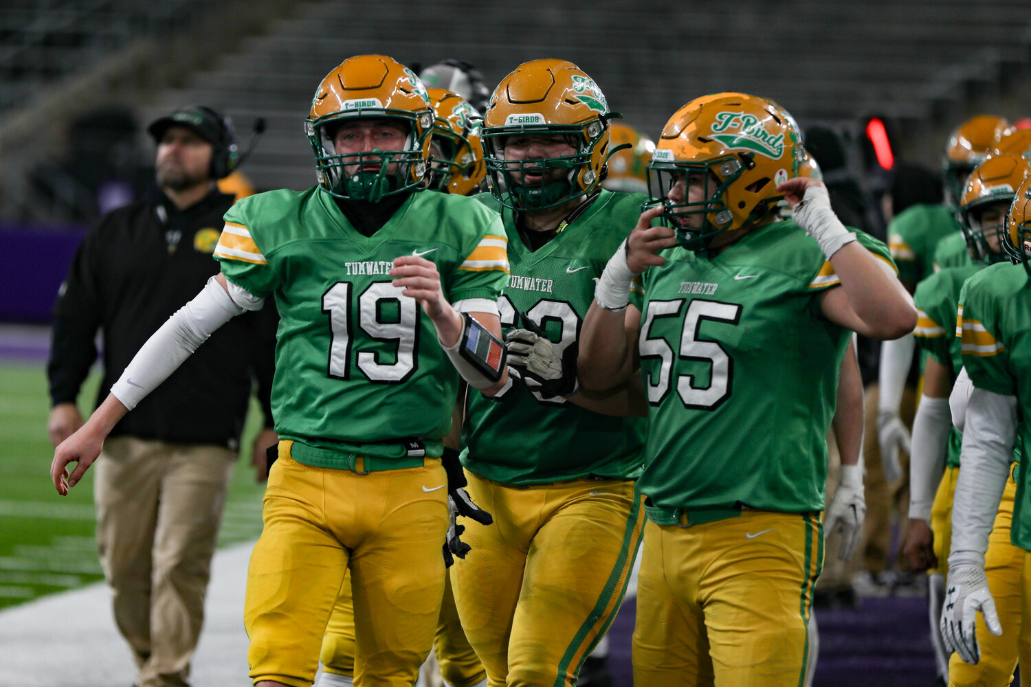 Tumwater players after a 60-30 loss to Anacortes Dec. 2. at Husky Stadium.
